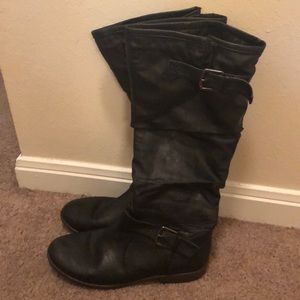Tall black leather boots